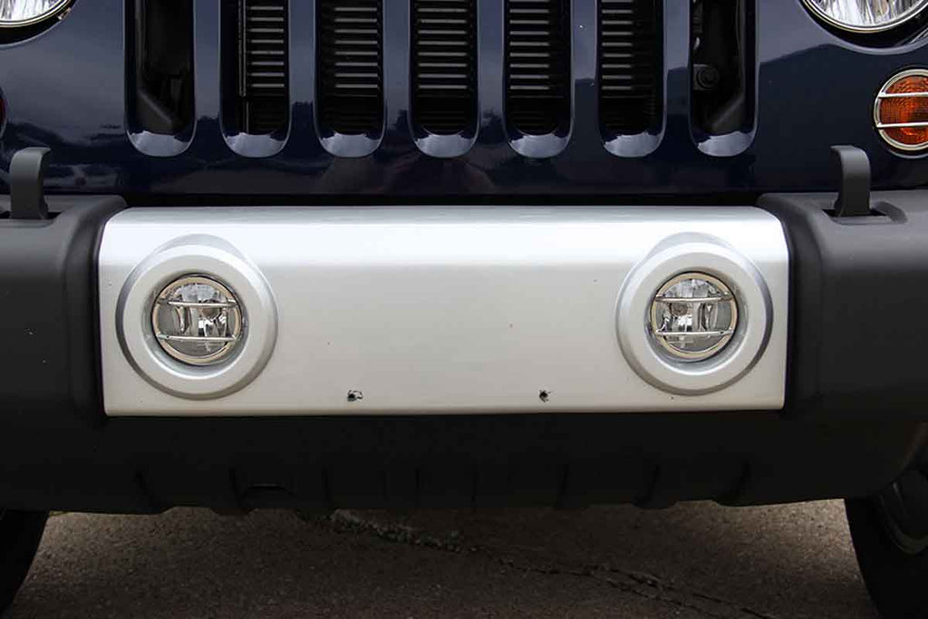 Installed Kentrol T-304 stainless-steel front marker covers for Jeep JK, showcasing the polished stainless-steel