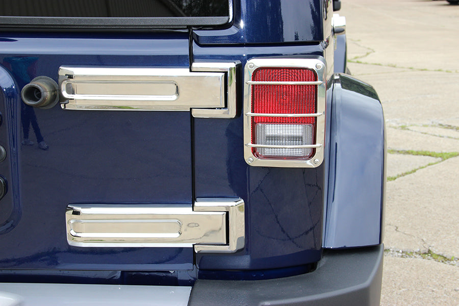 Installed Kentrol T-304 stainless steel tailgate hinges for Jeep Wrangler JK, showcasing the polished stainless steel
