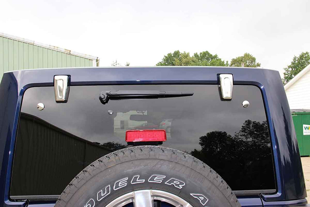 Installed Kentrol T-304 stainless-steel liftgate hinges for Jeep Wrangler JK, showcasing the polished stainless-steel
