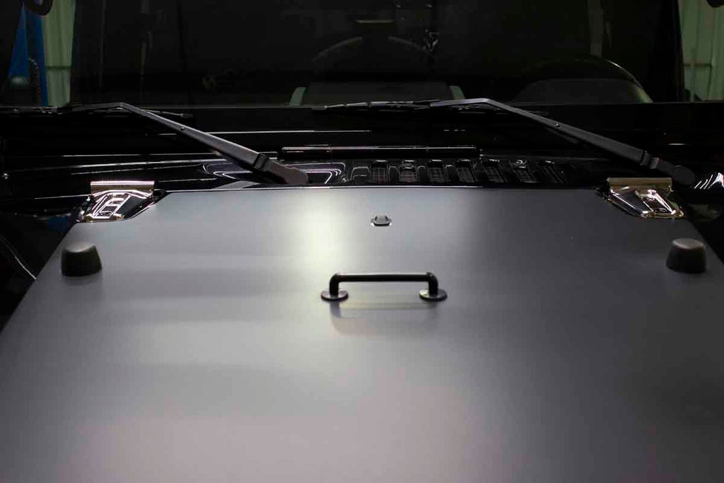Frontal view of the two Kentrol Hinge Overlays For 2007-2018 Jeep Wrangler 30019 installed to the vehicle