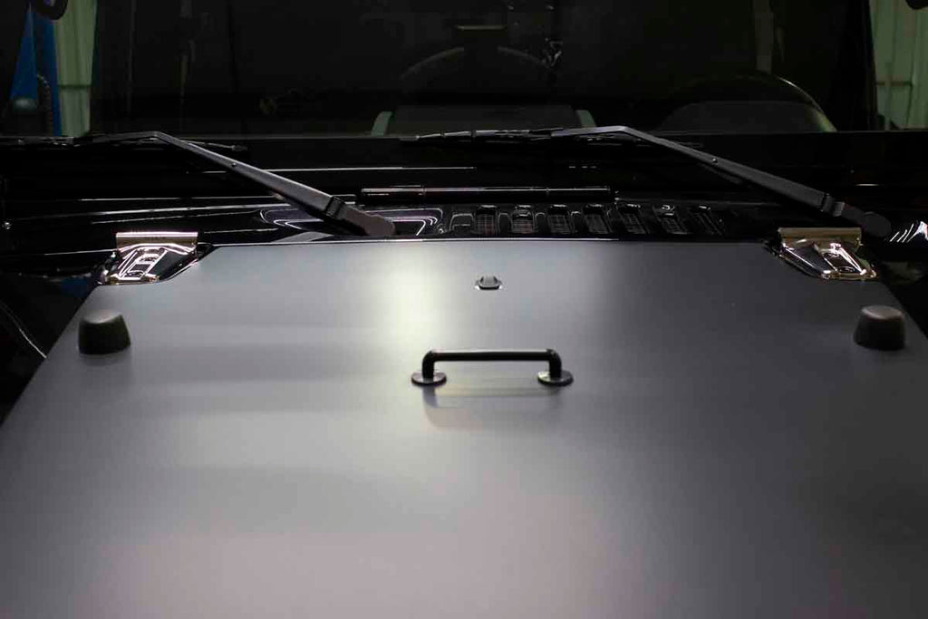 Installed Kentrol T-304 stainless steel hinges for Jeep Wrangler JK, showcasing the polished stainless steel