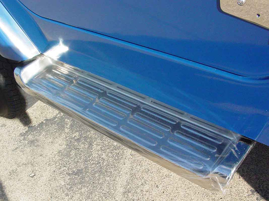 Close-up shot, showing one of two Kentrol Side Steps for 2002-2006 Jeep Wrangler 30518 installed to the vehicle's body