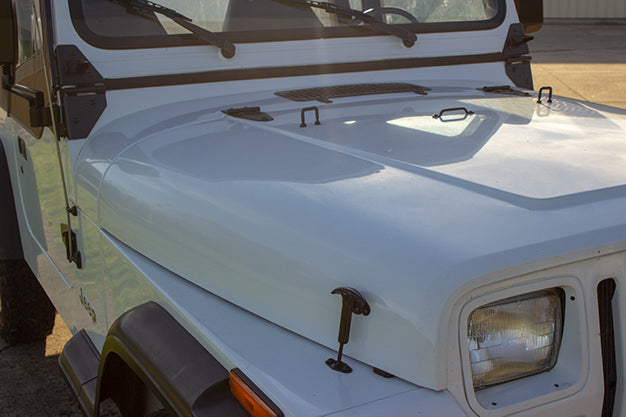 Wide angle of one of the two Kentrol Hood Catches for 1955–1995 Jeep CJ/Wrangler 50401 installed to the vehicle