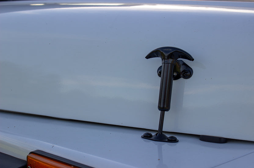 One of the two Kentrol Hood Catches for 1955–1995 Jeep CJ/Wrangler 50401 installed to the vehicle