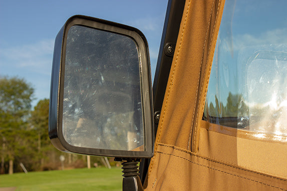 Close-up shot of one of the Kentrol Mirrors for 1988–2006 Jeep Wrangler 50475 installed to the vehicle