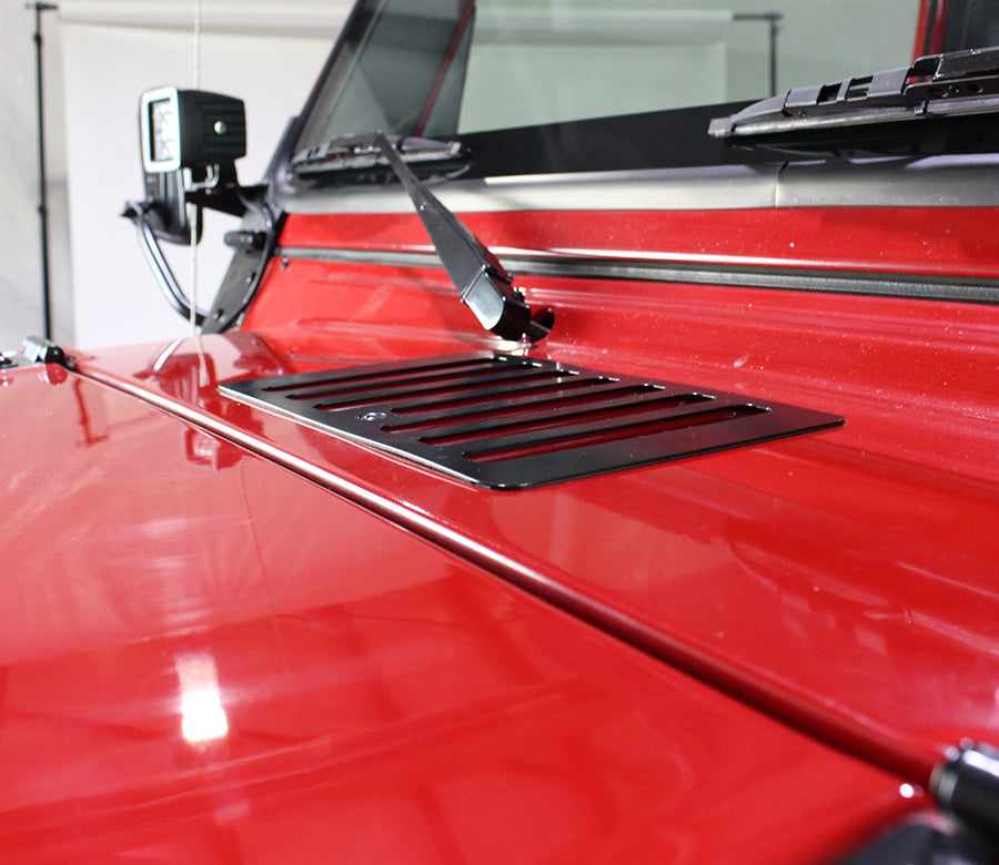 Flat angle, side view of Kentrol Hood Vent for 1998-2006 Jeep Wrangler 50500 installed to the hood