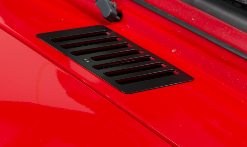 Close-up side view of Kentrol Hood Vent for 1998-2006 Jeep Wrangler 50500 installed to the hood