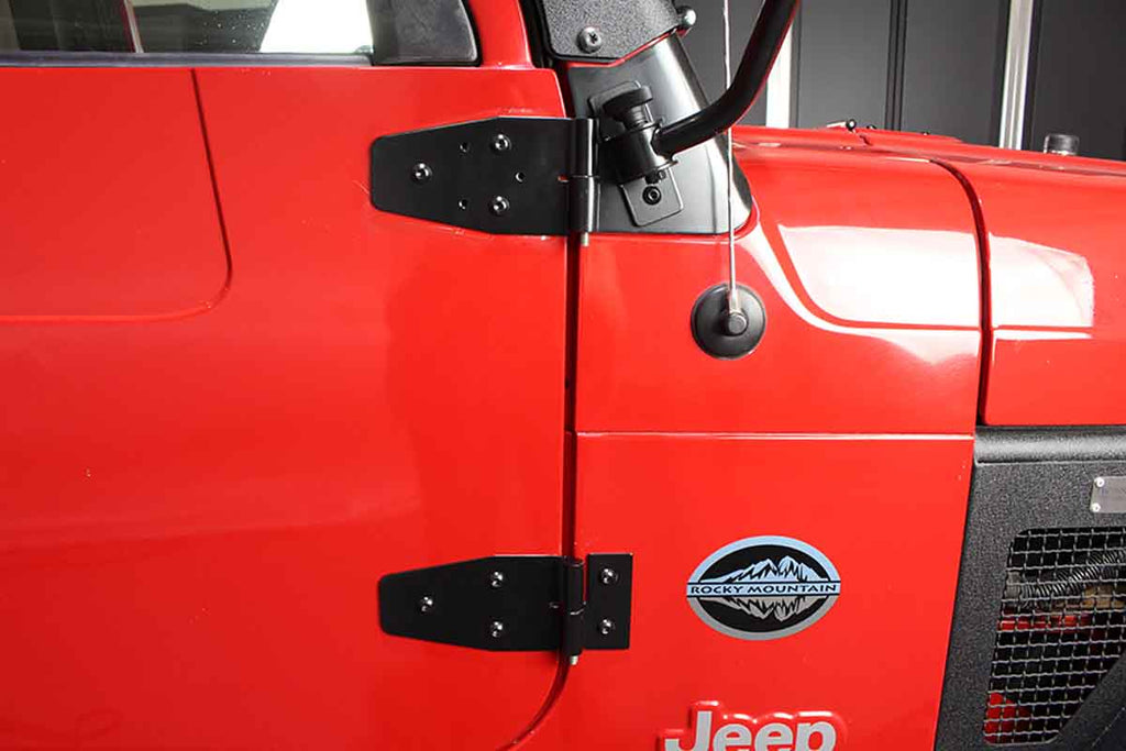 Installed Kentrol T-304 stainless steel hinges for Jeep Wrangler TJ, showcasing the black powder coated stainless steel 