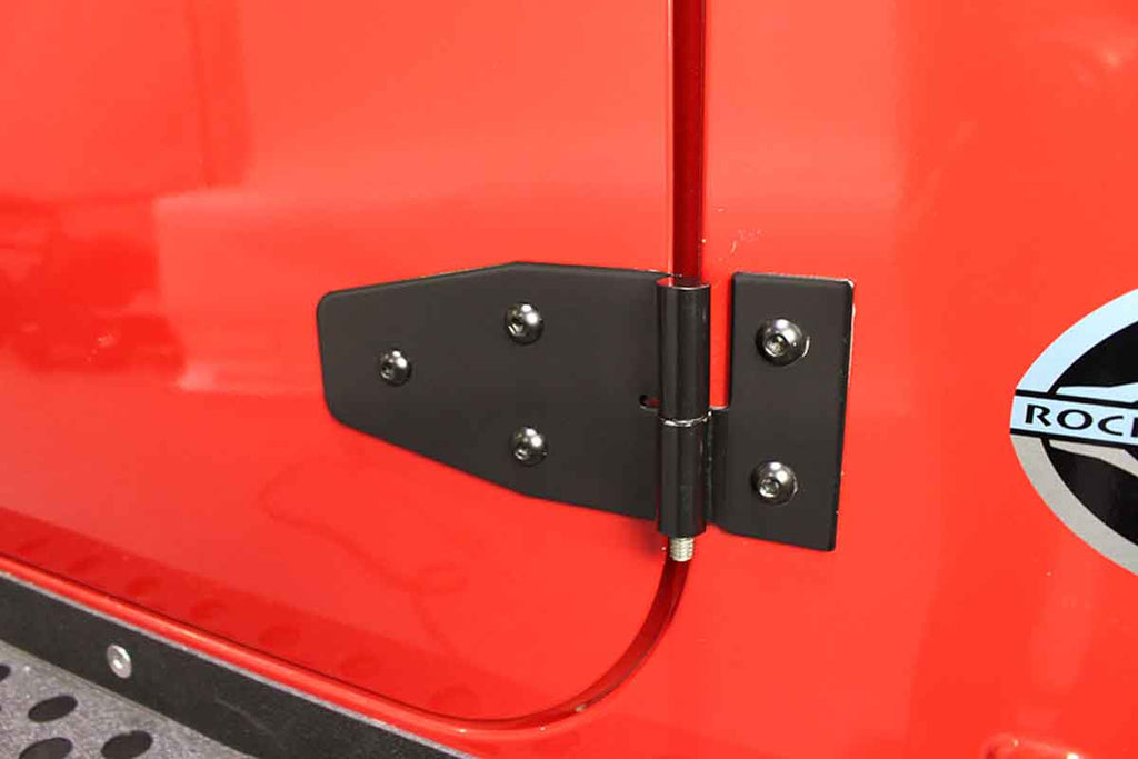 Installed Kentrol T-304 stainless steel hinges for Jeep Wrangler TJ, showcasing the black powdercoated stainless steel 