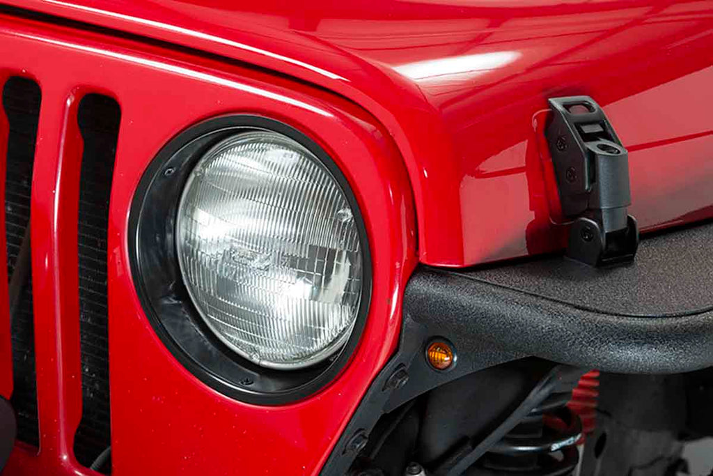 Side view of one of the two Kentrol Headlight Bezels for 1997-2006 Jeep Wrangler 50543 installed to the vehicle