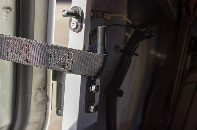 Close-up shot of one of two Door Strap Pins in the Kentrol Door Strap Pins For 1976-1986 Jeep CJ 50549 installed to the vehicle