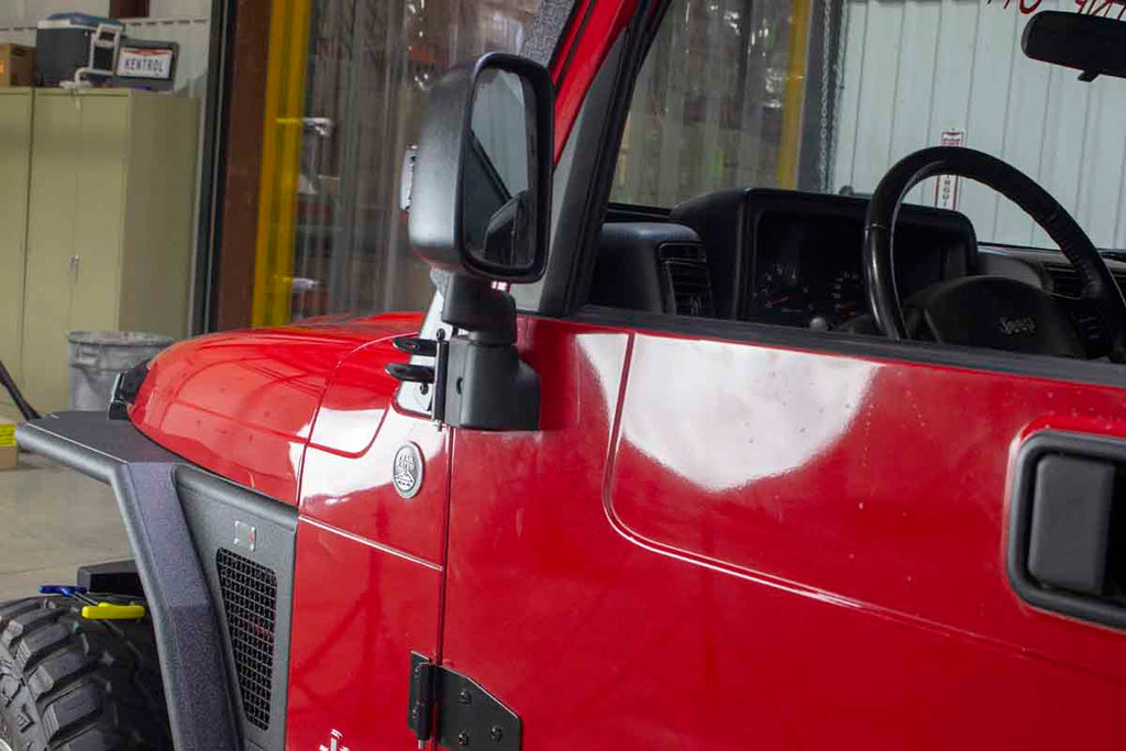 Two of four of the Kentrol Door Hinge Set for 2003-2006 Jeep Wrangler 50719 installed to the vehicle's body