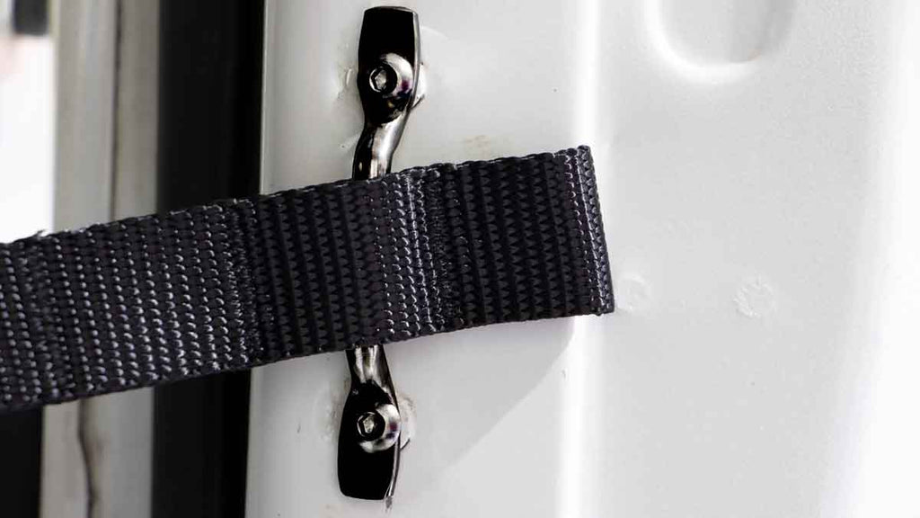 Close-up shot of the Kentrol Door Strap Kit for 1997-2006 Jeep Wrangler 50724 installed to the vehicle