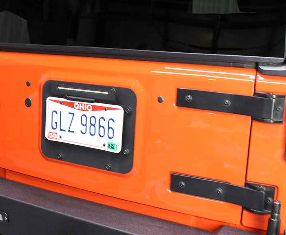 Side view of the Kentrol Tailgate Plugs for 2007-2018 Jeep Wrangler 70004 installed to the vehicle