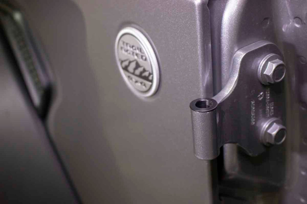 One of the Kentrol Door Hinge Liners for 2018 & Up Jeep Wrangler, 2020 & Up Gladiator 70012 installed to the vehicle