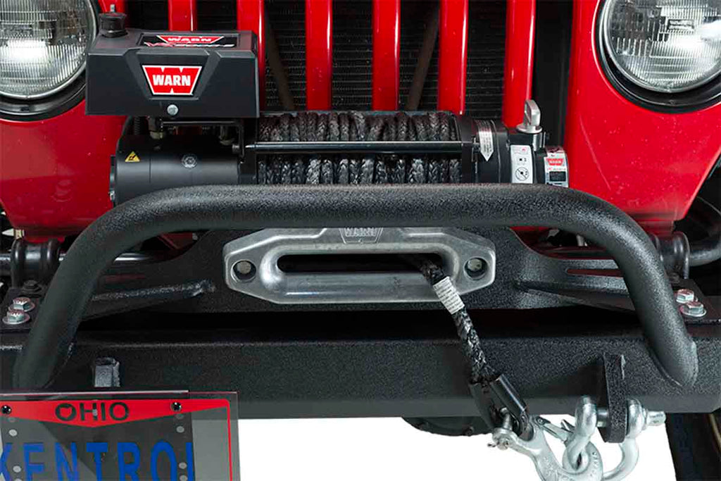 Close-up view of Kentrol Shackle Mounted License Plate Bracket 80706 installed to the vehicle's front bumper
