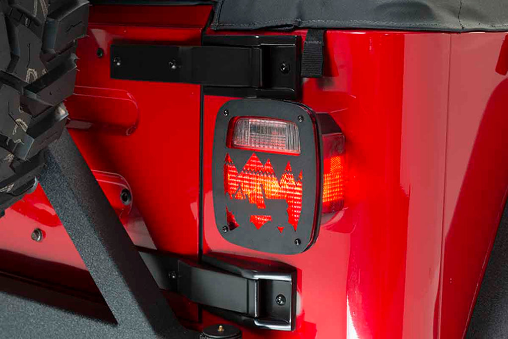 Side view of the Kentrol Heritage Taillight Guards for 1976-2006 CJ/Wrangler 80709 installed to the vehicle