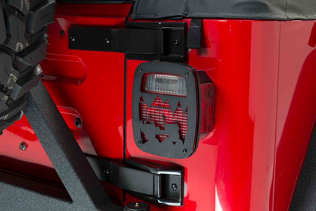 Side view of the Kentrol Heritage Taillight Guards for 1976-2006 CJ/Wrangler 80709 installed to the vehicle