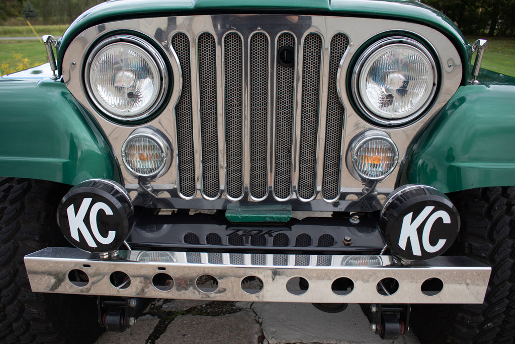 Close-up shot of the Kentrol Front Bumper w/holes For 1955-1986 Jeep CJ 30429 installed to the vehicle