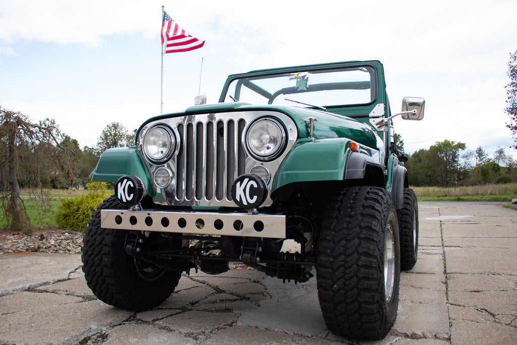 Side view of the Kentrol Front Bumper w/holes For 1955-1986 Jeep CJ 50429 installed to the vehicle