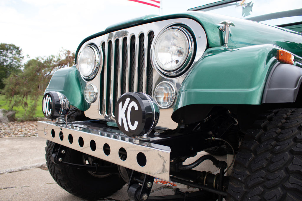 Side view of the Kentrol Front Bumper w/holes For 1955-1986 Jeep CJ 30429 installed to the vehicle